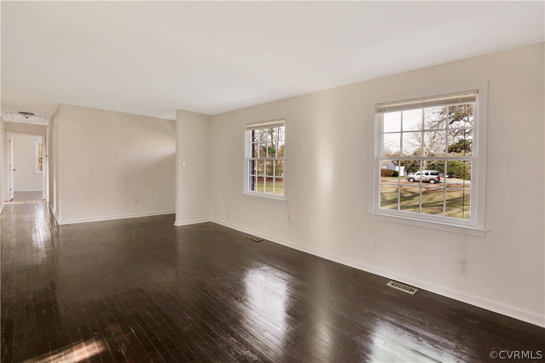 4601 Treely Road Chester, VA 23831 - Photo 6 of 27 a view of an empty room with wooden floor and a window