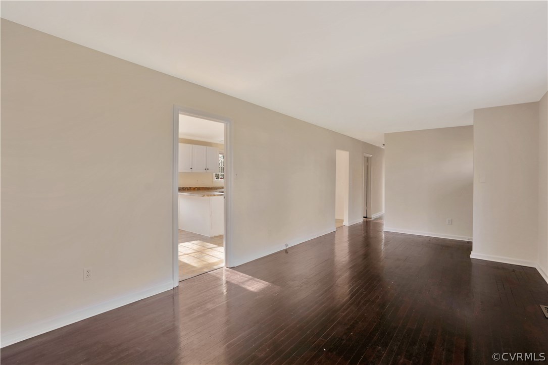 4601 Treely Road Chester, VA 23831 - Photo 7 of 27 an empty room with wooden floor and windows