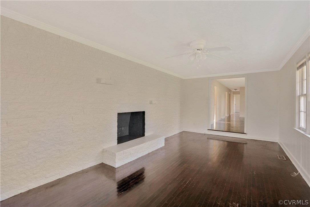 4601 Treely Road Chester, VA 23831 - Photo 10 of 27 wooden floor in an empty room with a window