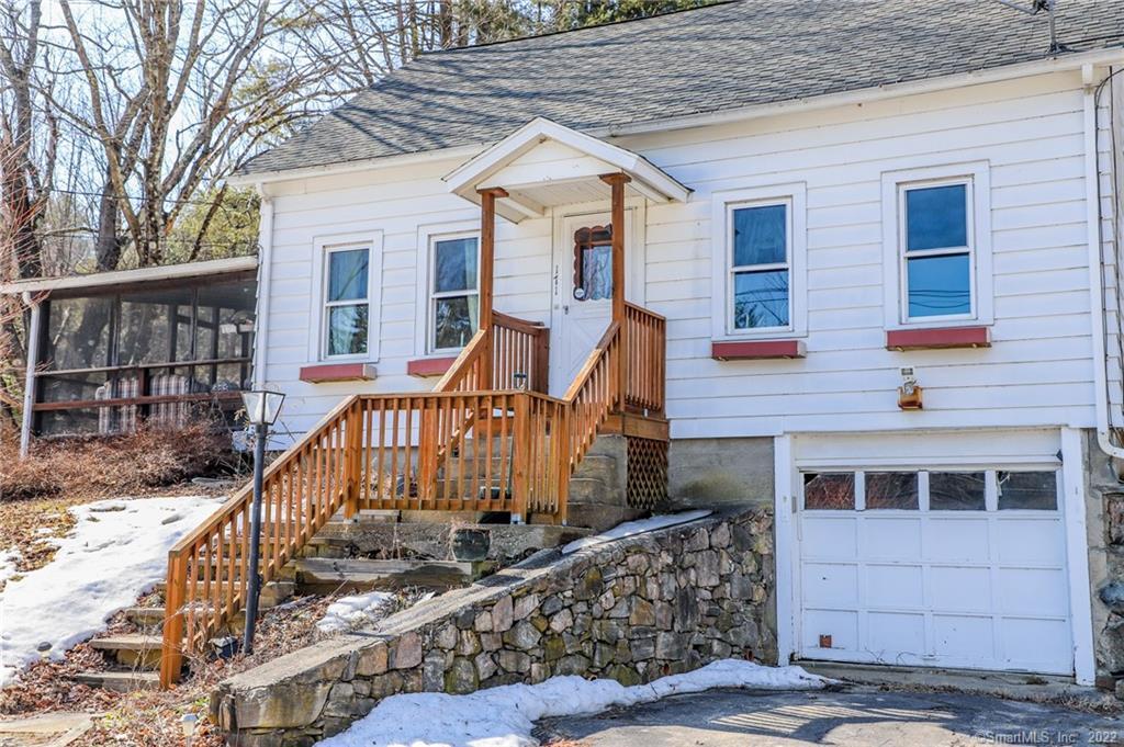 171 Colebrook River Road Winchester, CT 06098 - Photo 1 of 1 a view of a house with wooden stairs