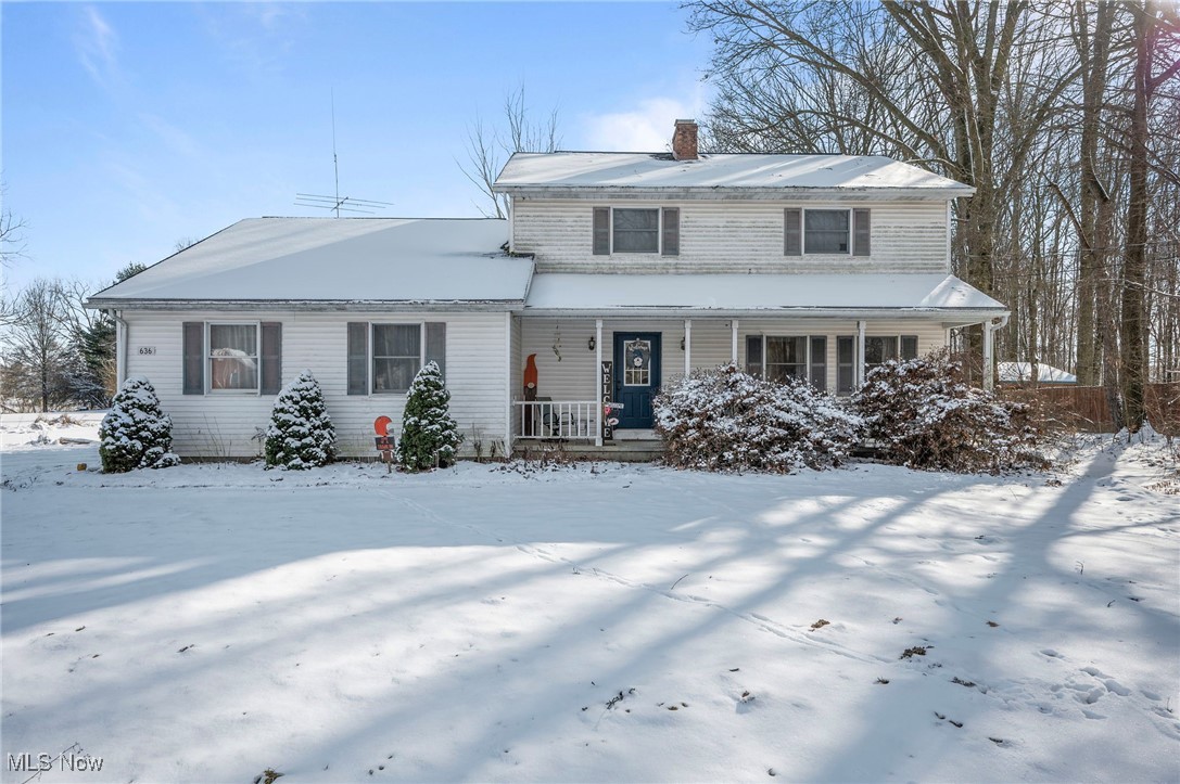 636 Wall Road Wadsworth, OH 44281 - Photo 1 of 35 Traditional-style house with a porch and a chimney
