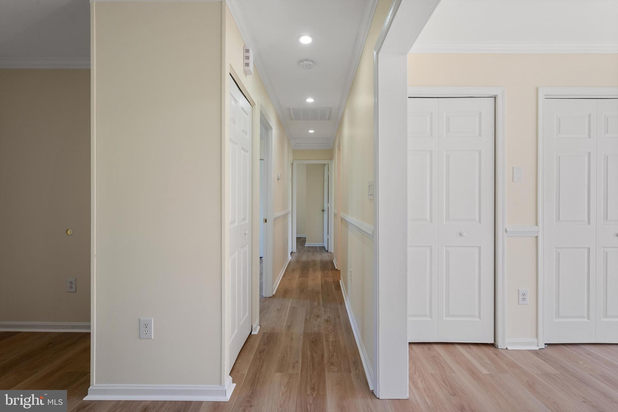 852 Morgan Place Front Royal, VA 22630 - Photo 11 of 36 a view of a hallway with wooden floor and closet area