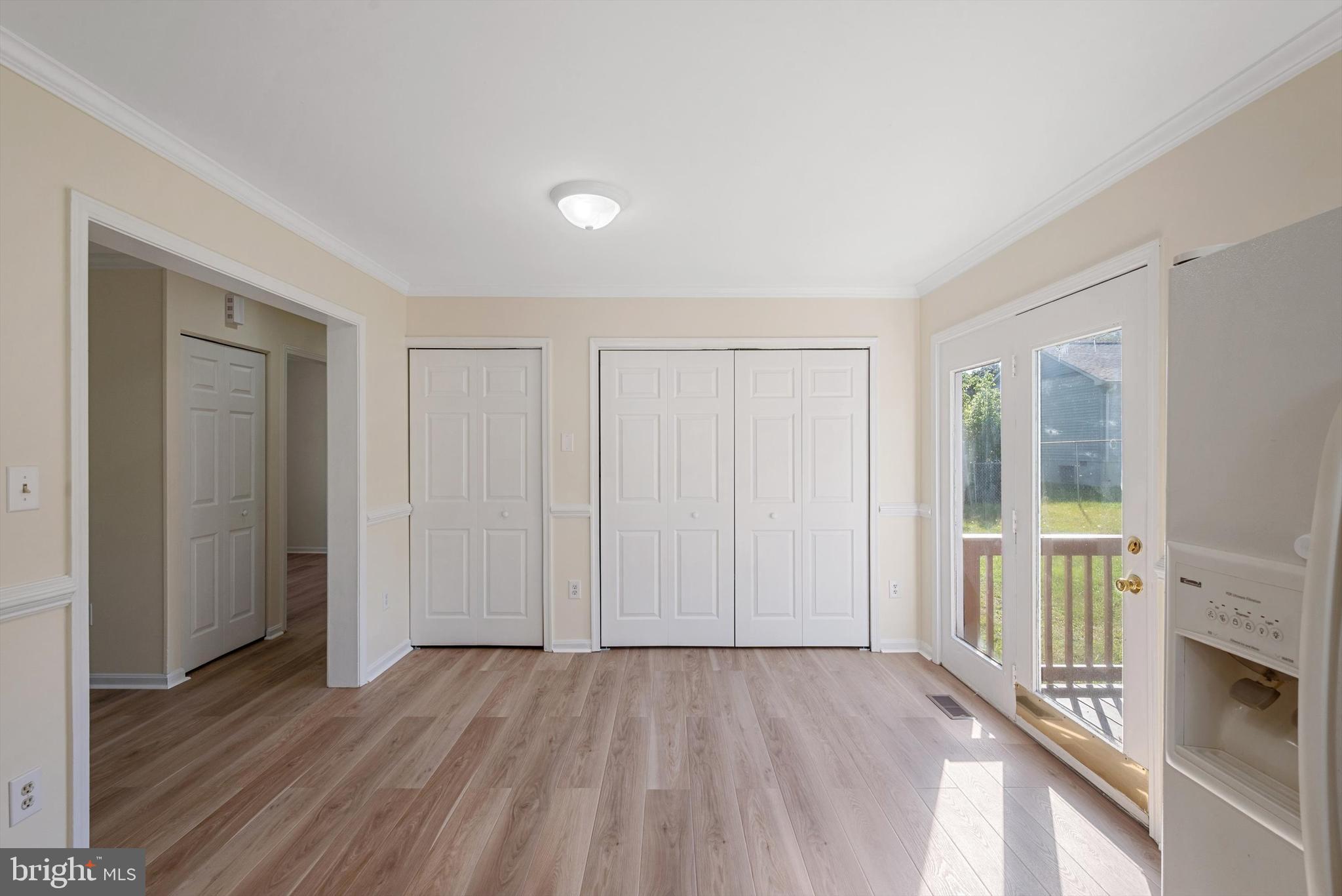 852 Morgan Place Front Royal, VA 22630 - Photo 12 of 36 wooden floor in an empty room with a window