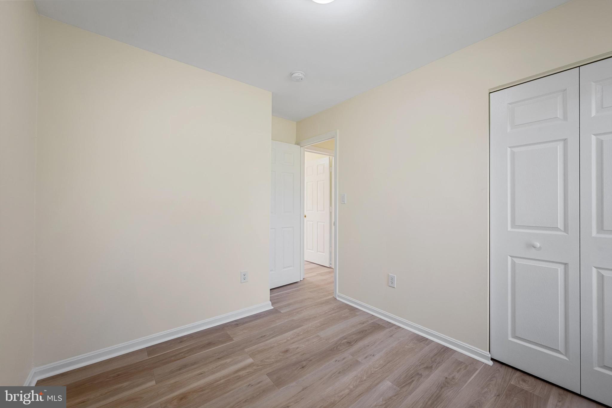 852 Morgan Place Front Royal, VA 22630 - Photo 23 of 36 a view of an empty room with wooden floor