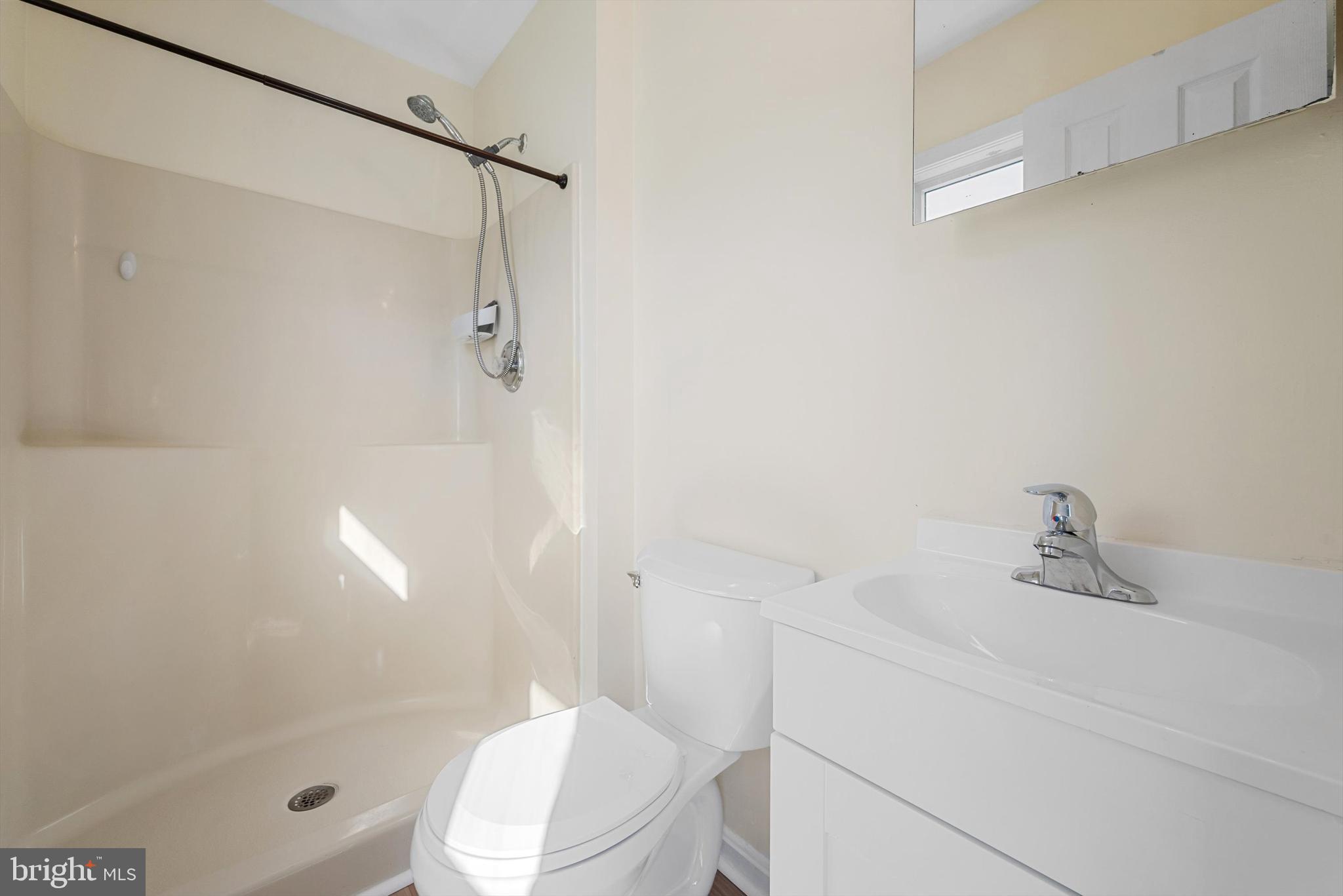 852 Morgan Place Front Royal, VA 22630 - Photo 24 of 36 a bathroom with a sink a toilet and shower