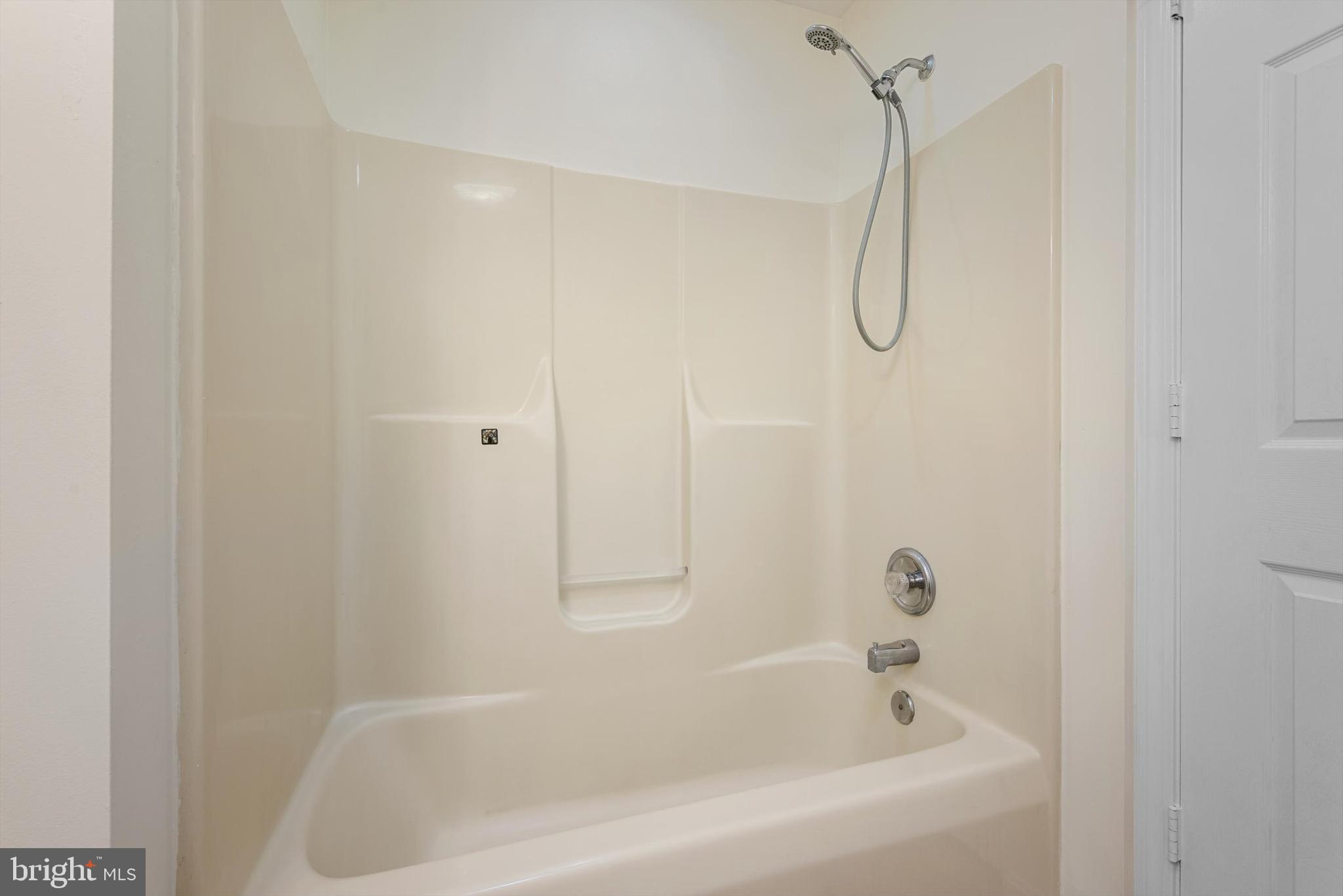 852 Morgan Place Front Royal, VA 22630 - Photo 28 of 36 a bathroom with a bath tub with a shower