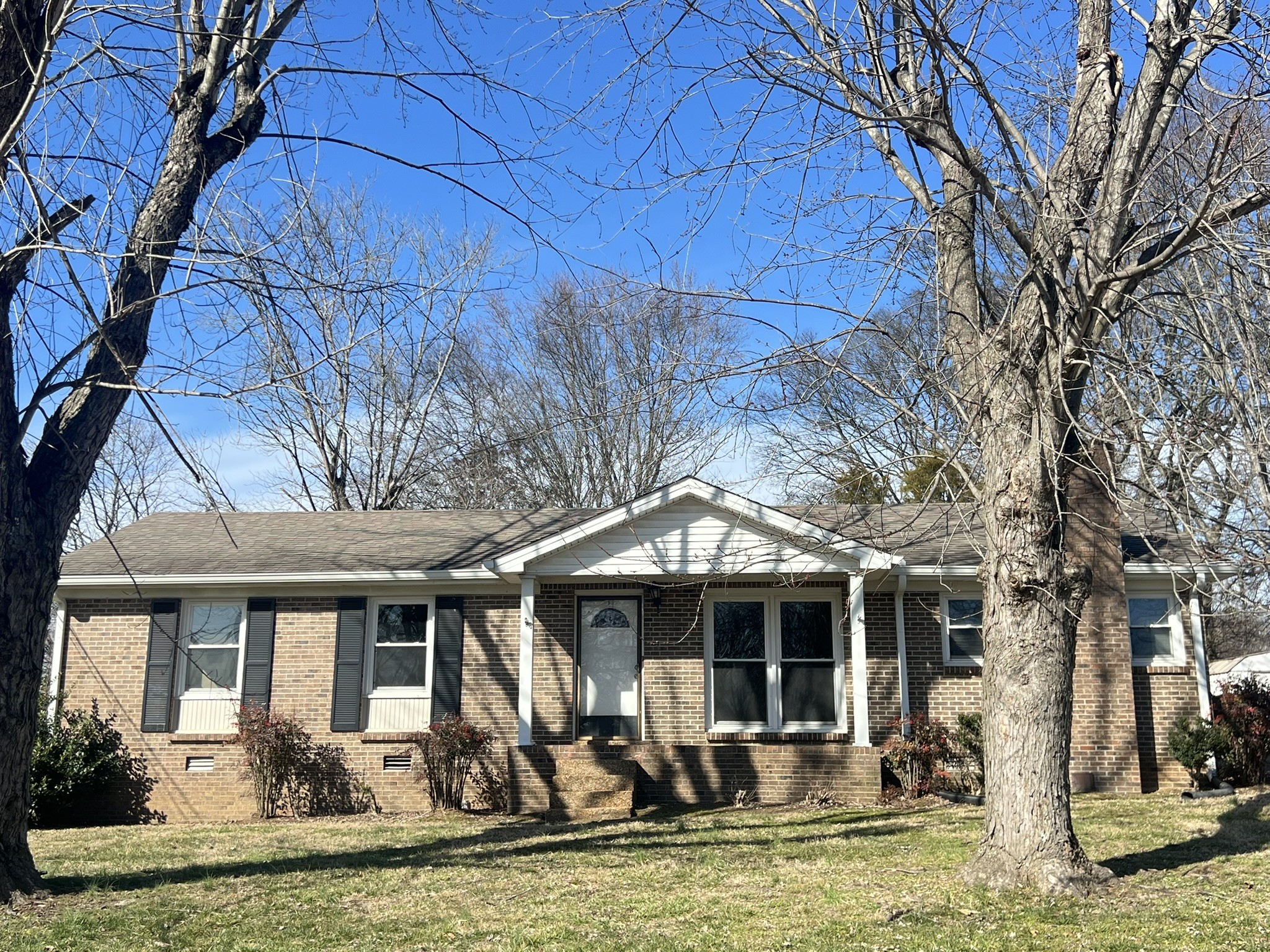 442 Rodney Street Gallatin, TN 37066 - Photo 13 of 21 a front view of a house with swimming pool and glass windows