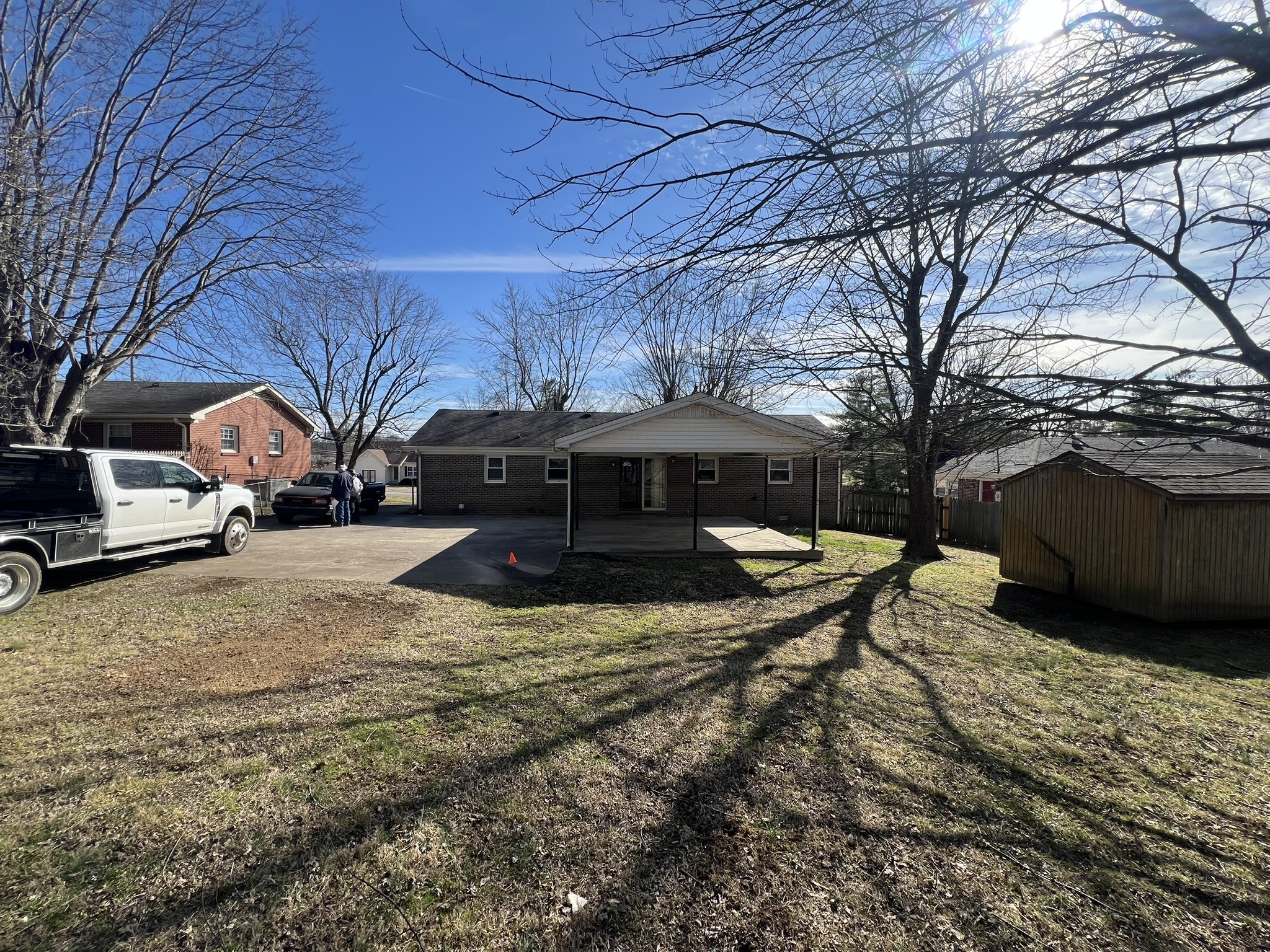 442 Rodney Street Gallatin, TN 37066 - Photo 19 of 21 a view of a yard with a car parked
