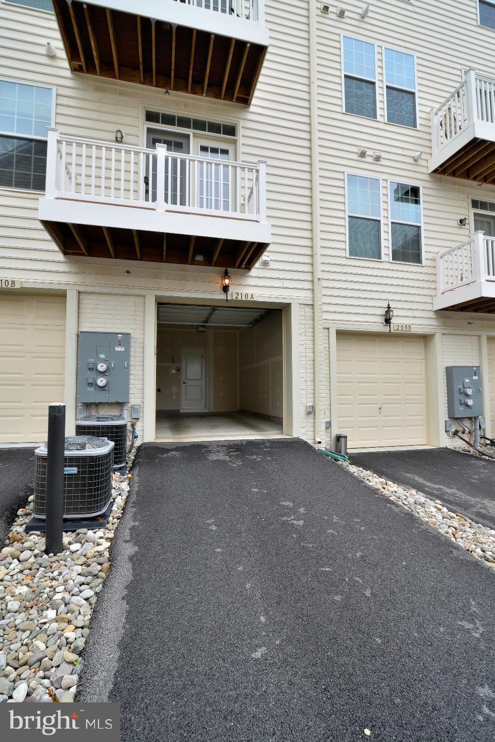 210 Mill Pond Road, Unit A Frederick, MD 21701 - Photo 24 of 30 Garage and driveway parking