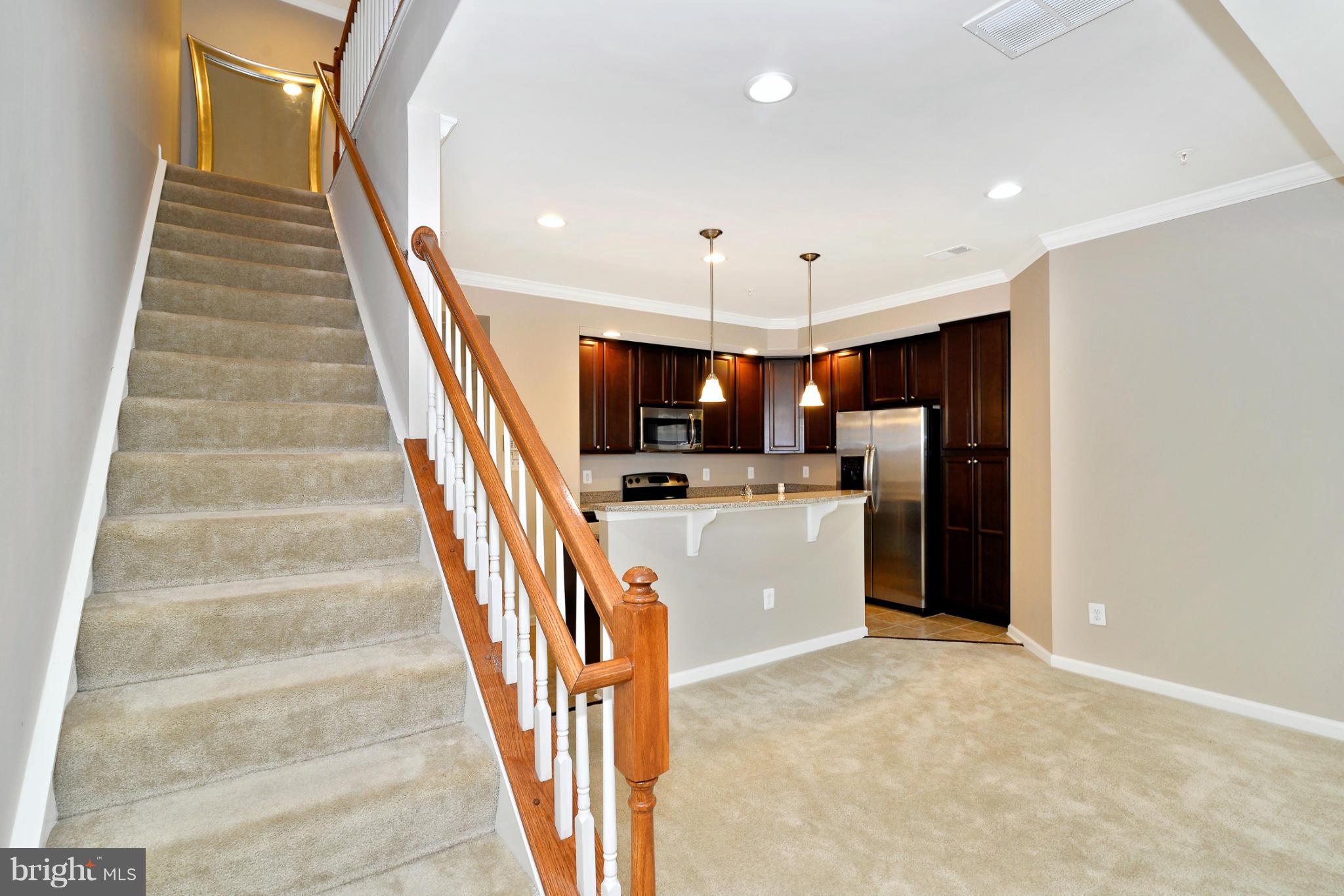 210 Mill Pond Road, Unit A Frederick, MD 21701 - Photo 9 of 30 Staircase to 2nd level