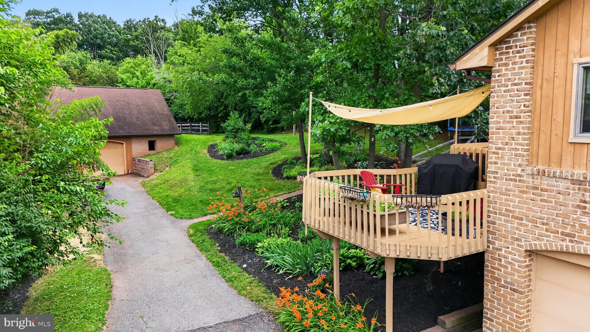 2571 Valley View Road Morgantown, PA 19543 - Photo 50 of 75 Serene garden retreat with deck views.