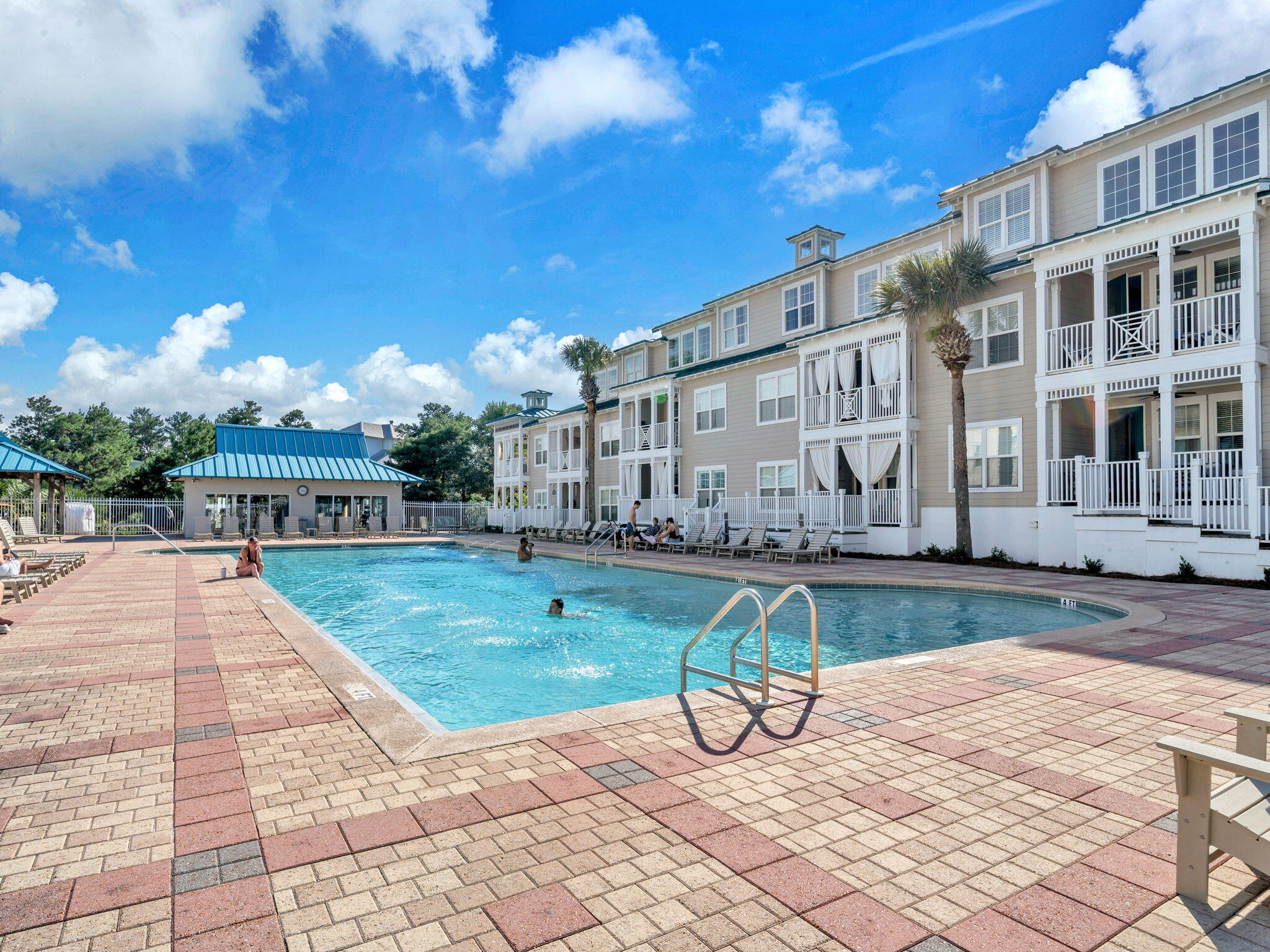 117 Village Boulevard, Unit 711 Santa Rosa Beach, FL 32459 - Photo 28 of 47 a view of a house with swimming pool and sitting area