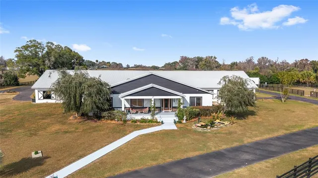 a kitchen with a sink stove and refrigerator