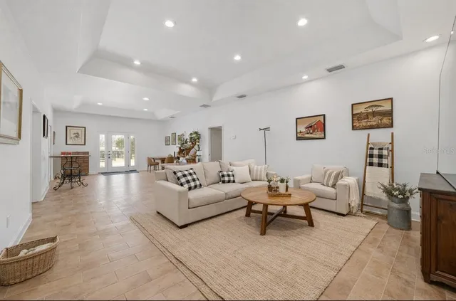 a view of a storage and utility room with wooden floor