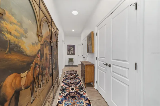 a bedroom with a bed dresser and a window