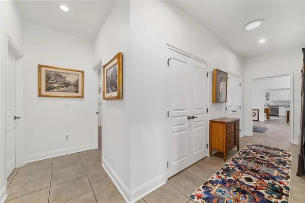 a kitchen with stainless steel appliances a sink and a refrigerator