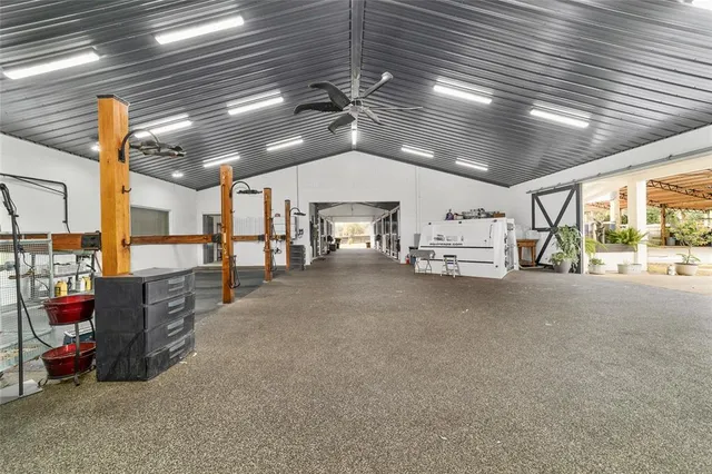 a bathroom with a toilet and a mirror