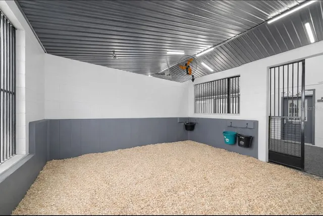 a view of a swimming pool and an outdoor space