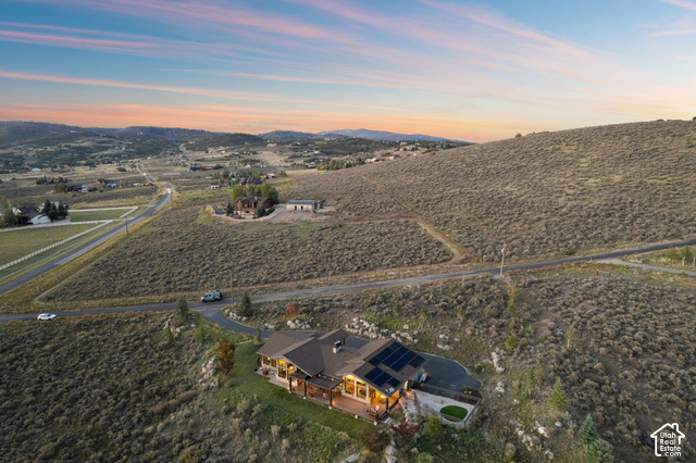 1130 Pace Road Park City, UT 84098 - Photo 69 of 73 Expansive property featuring a single-story residence with a dark-tiled roof and integrated solar panels