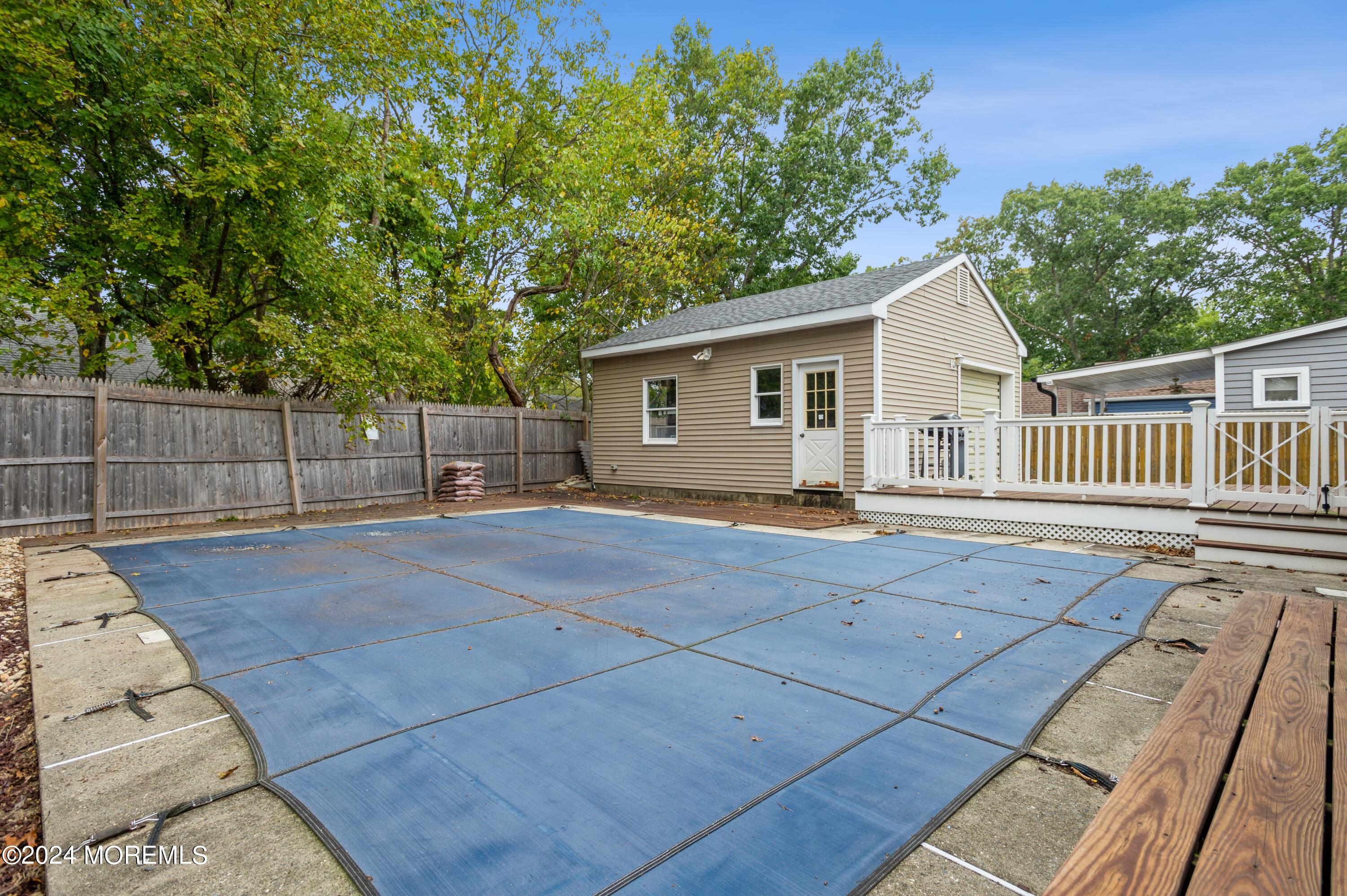 19 Holly Road Brick, NJ 08723 - Photo 14 of 16 a view of backyard with deck and outdoor seating