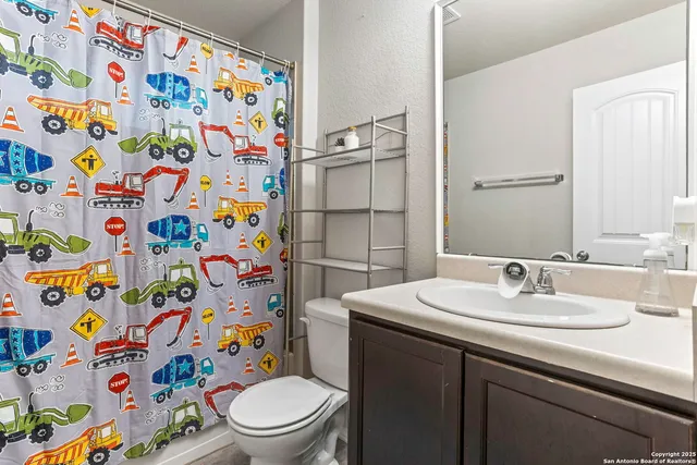 a bathroom with a sink and a toilet