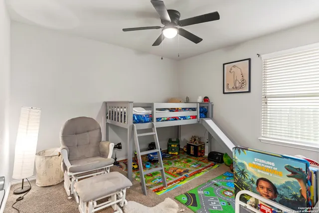 a play room with toys and a window