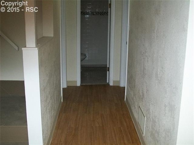 612 Sunset Road Colorado Springs, CO 80909 - Photo 16 of 27 Basement Level Hallway