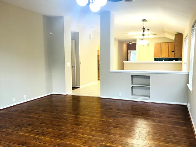 a view of a bathroom with a sink and a mirror