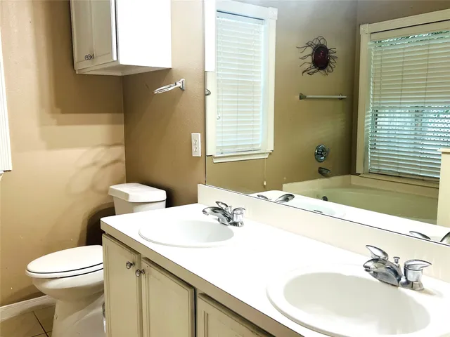 a bathroom with a sink and a toilet