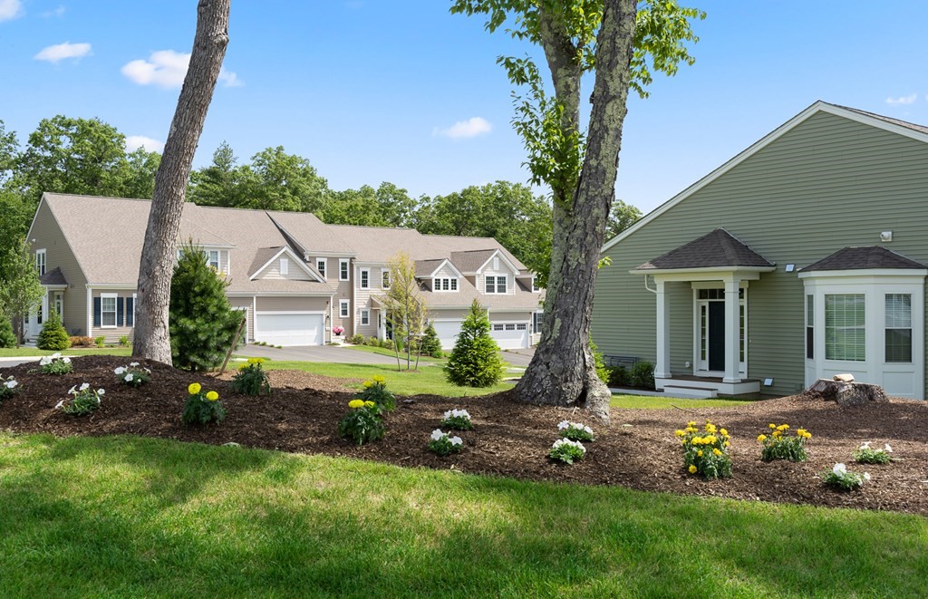 52 Sienna, Unit 47 Upton, MA 01568 - Photo 17 of 17 a front view of a house with garden