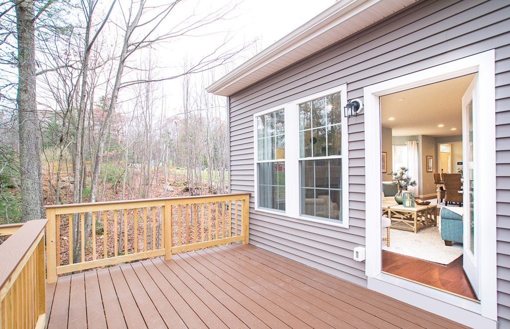 52 Sienna, Unit 47 Upton, MA 01568 - Photo 9 of 17 a view of a house with wooden deck