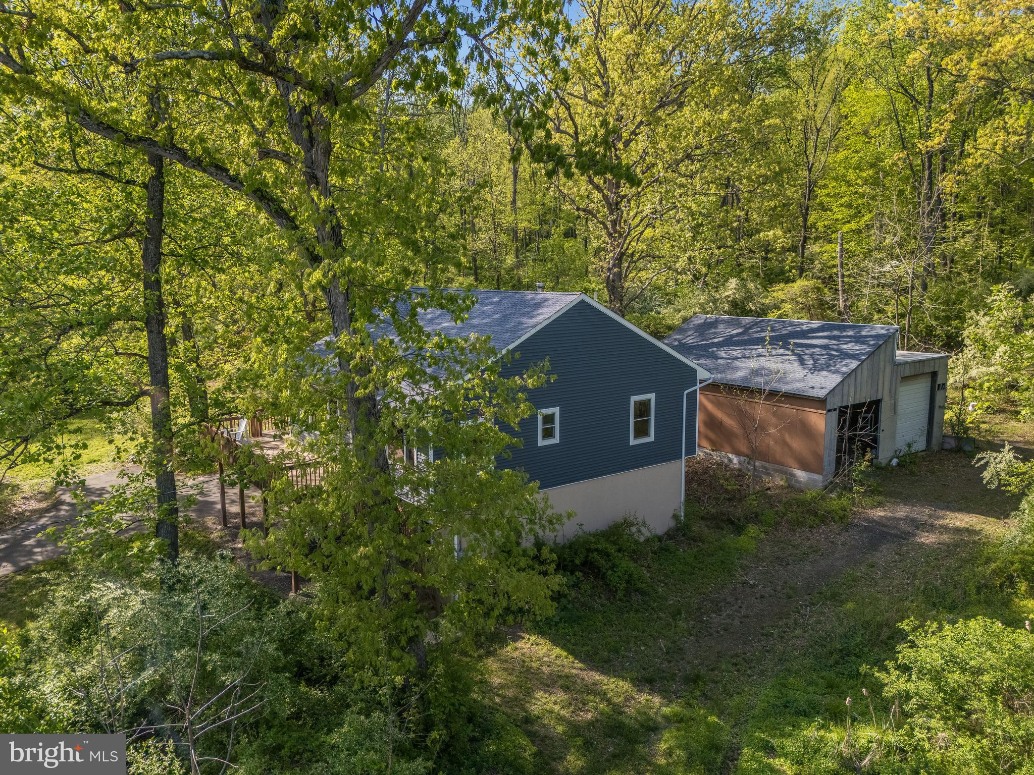 1556 River Road Titusville, NJ 08560 - Photo 4 of 38 Blue home w/ Barn behind it