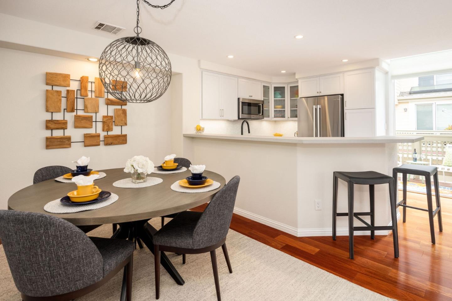 12 Patrick Way Half Moon Bay, CA 94019 - Photo 11 of 36 a view of a dining room with furniture window and wooden floor
