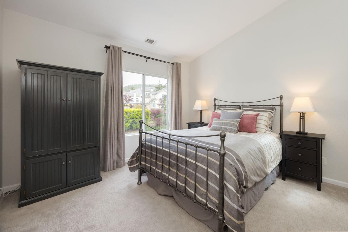 12 Patrick Way Half Moon Bay, CA 94019 - Photo 20 of 36 a bedroom with a bed and a window
