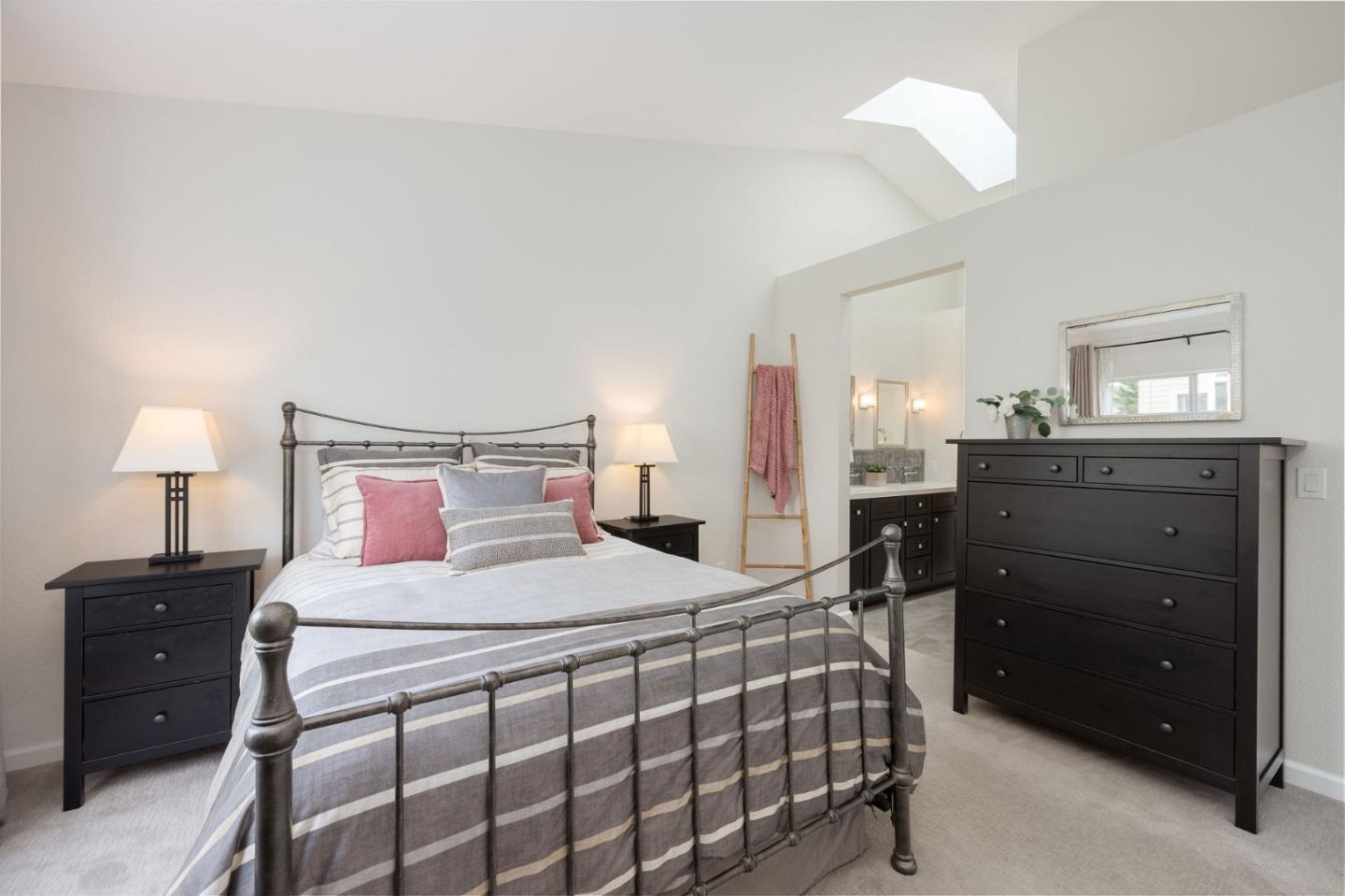 12 Patrick Way Half Moon Bay, CA 94019 - Photo 21 of 36 a bedroom with a bed and a lamp on dresser