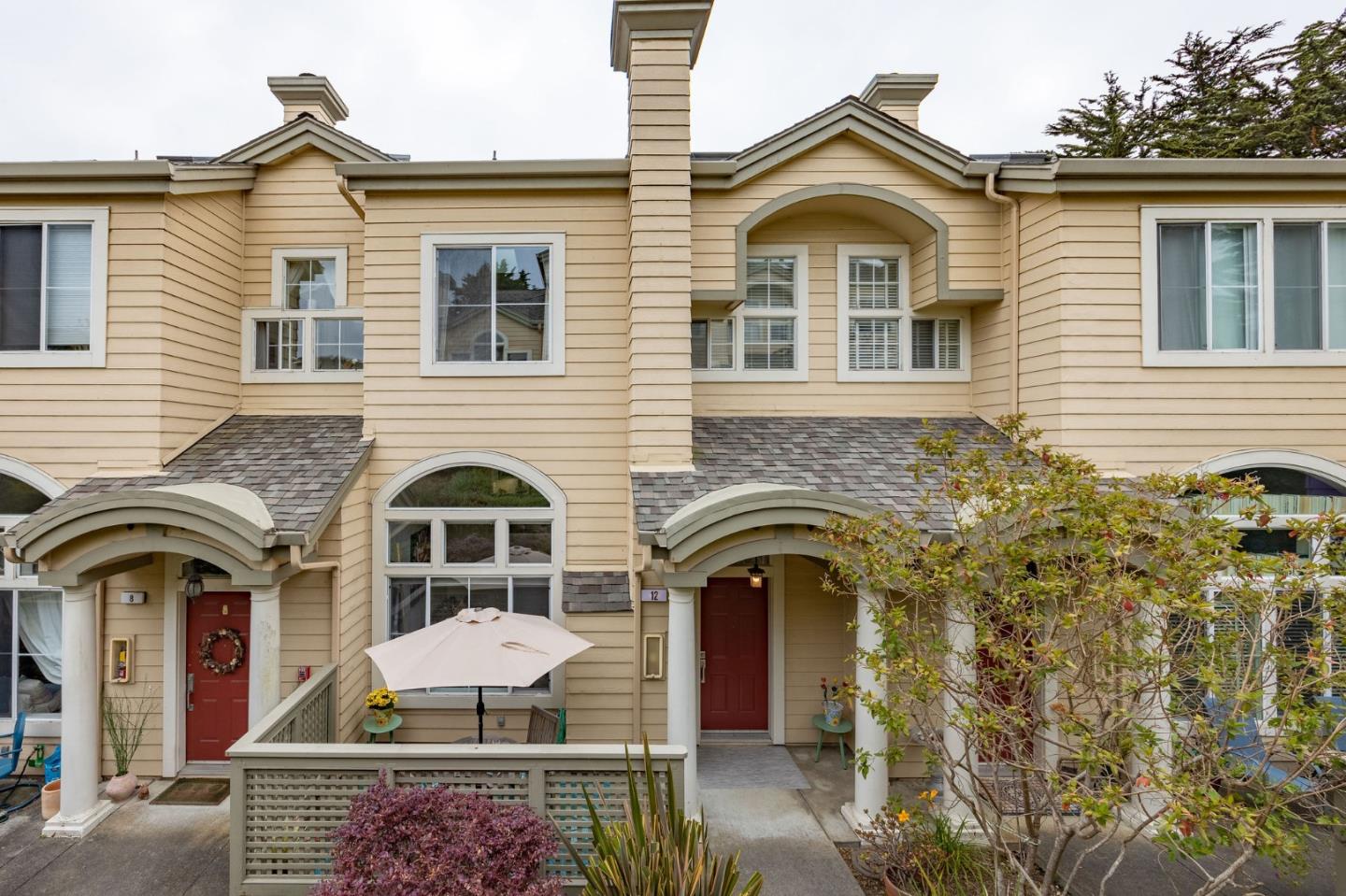 12 Patrick Way Half Moon Bay, CA 94019 - Photo 3 of 36 a front view of a house with plants