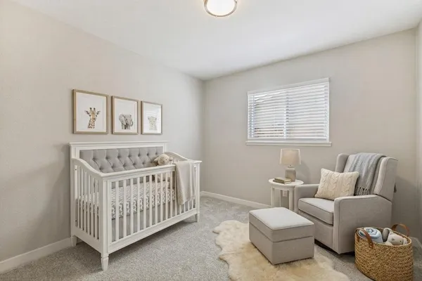 a bathroom with a toilet a sink and shower