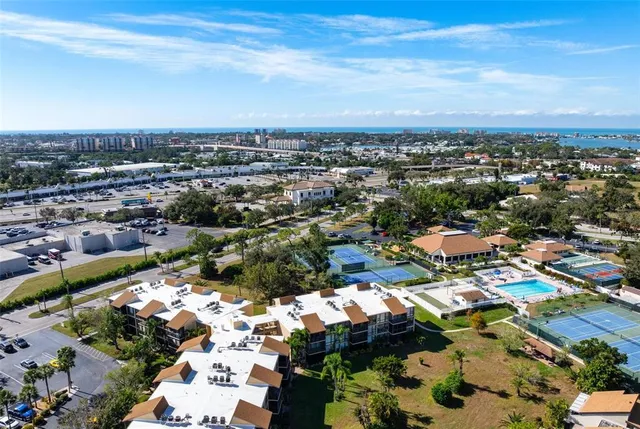 an aerial view of a city with lots of residential buildings