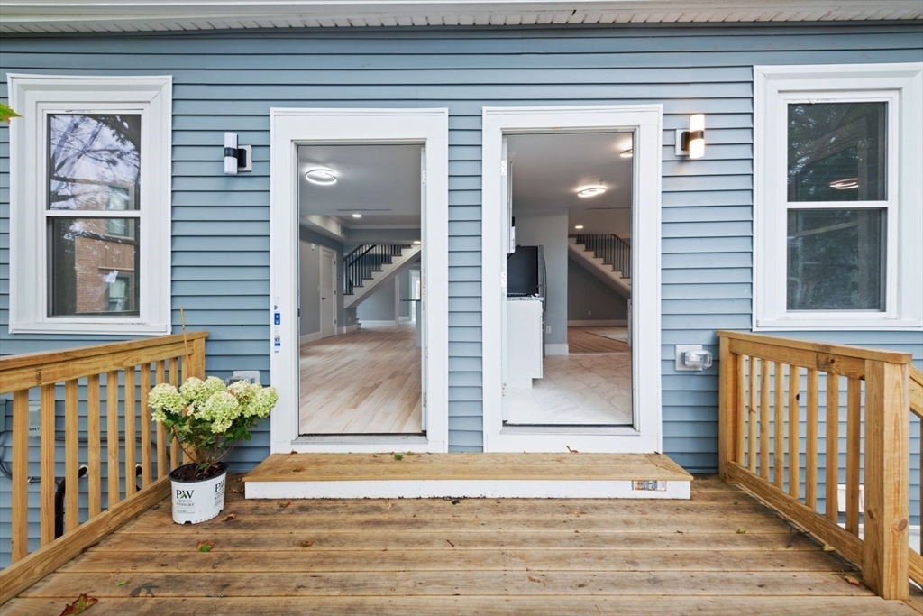 7 Waumbeck Street, Unit 2 Boston, MA 02121 - Photo 17 of 18 a view of porch with a bench