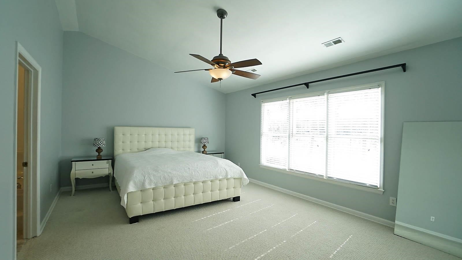 8300 Grey Abbey Place Raleigh, NC 27615 - Photo 21 of 34 Large owner's suite with vaulted ceiling and walk-in-closet. Owners Suite