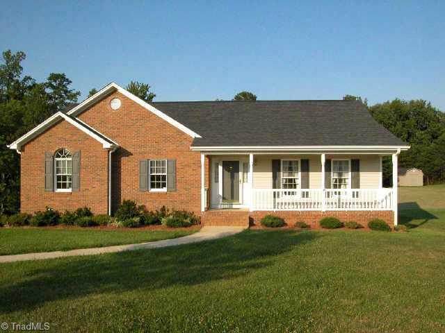 1040 Woodbury Road King, NC 27021 - Photo 1 of 9 Exterior Front. 1040 Woodbury Road (on 1.136 acre lot w/great level backyard)
