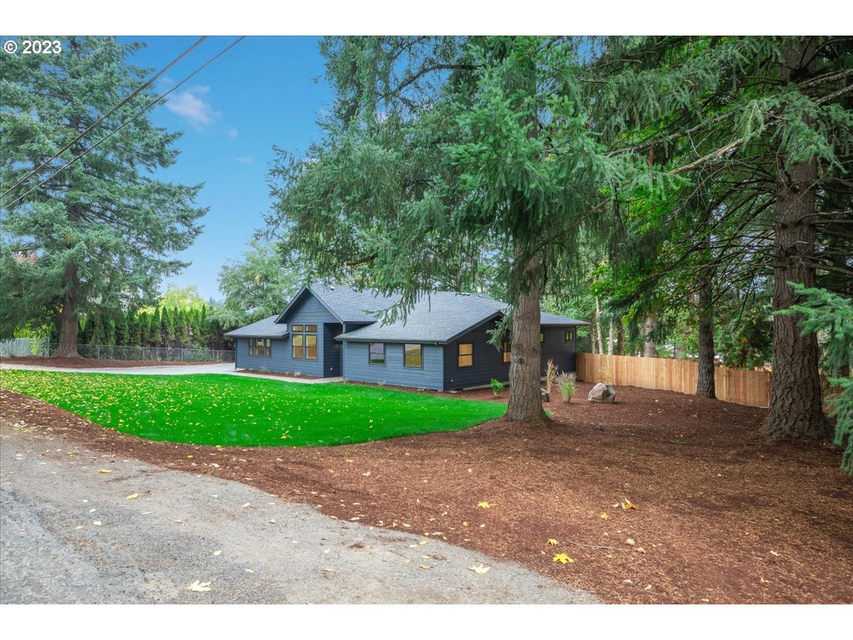 29475 Southeast Wheeler Road Boring, OR 97009 - Photo 3 of 45 a front view of a house with a yard and tree s