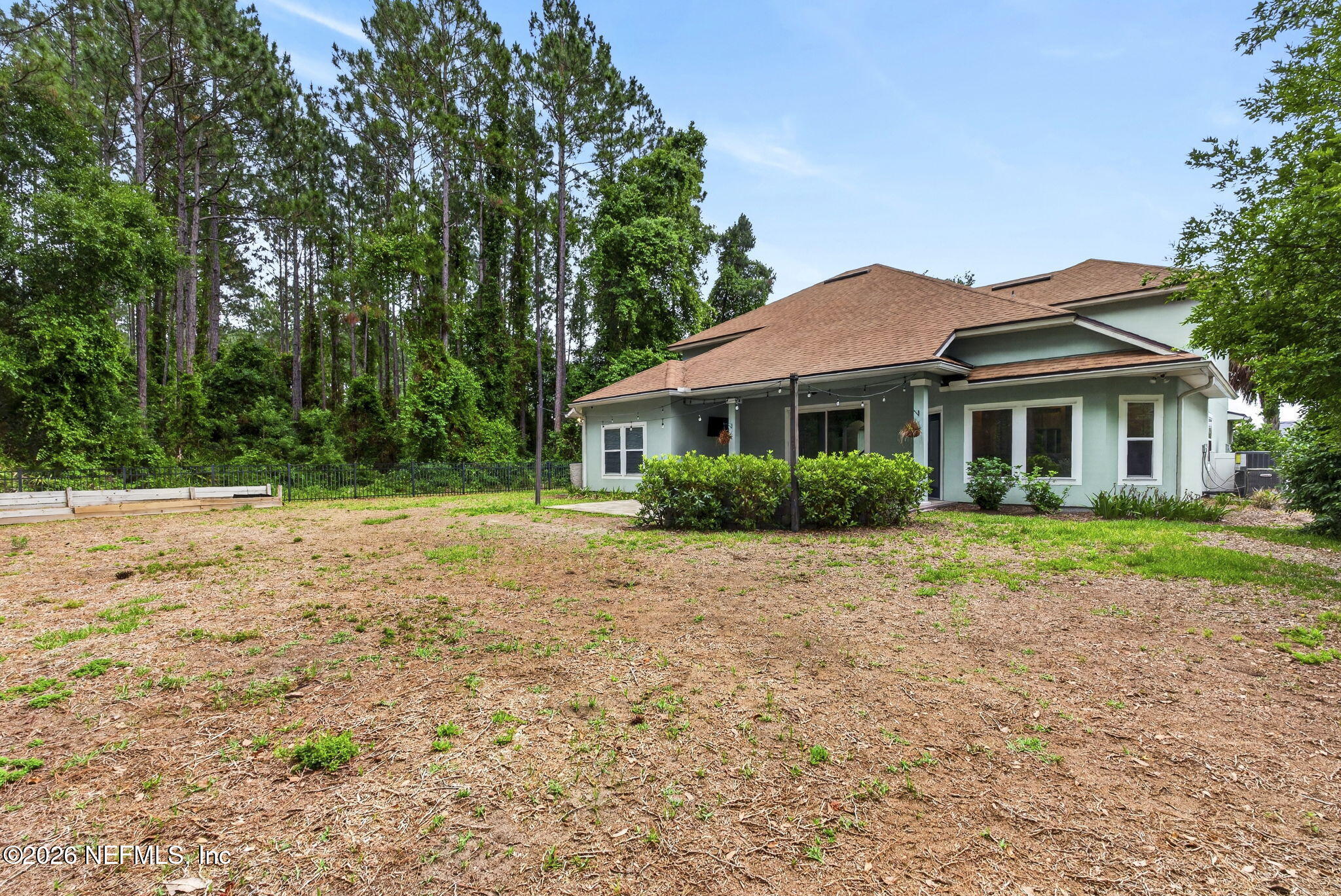 85667 Berryessa Way Fernandina Beach, FL 32034 - Photo 30 of 39 a front view of a house with a yard