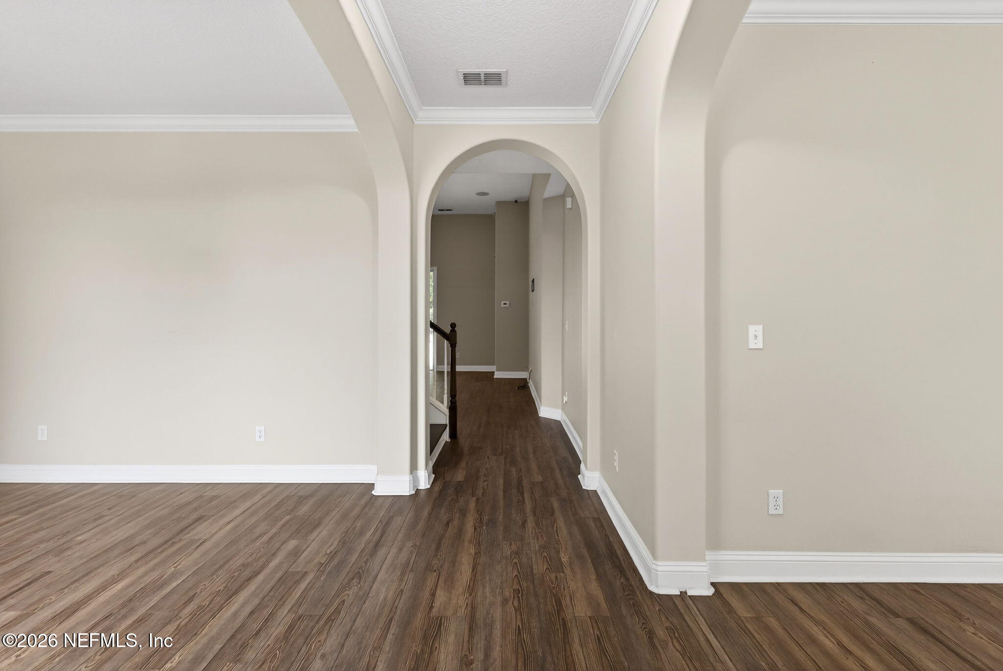 85667 Berryessa Way Fernandina Beach, FL 32034 - Photo 4 of 39 a view of a hallway with wooden floor and staircase