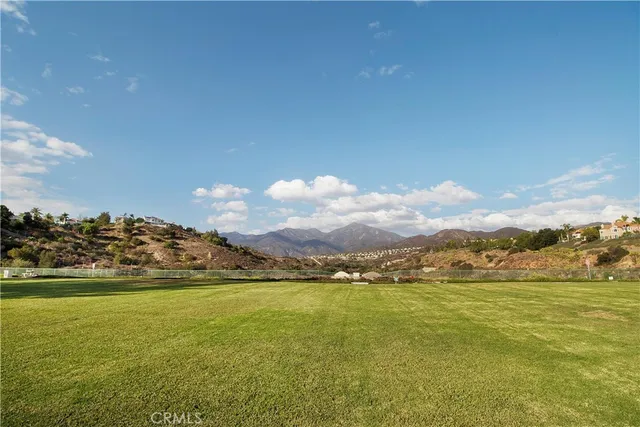 a view of an ocean and a mountain
