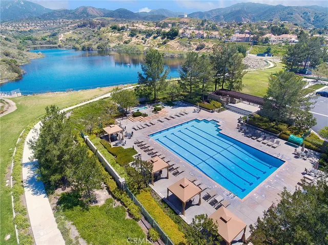 an aerial view of a house with a ocean view
