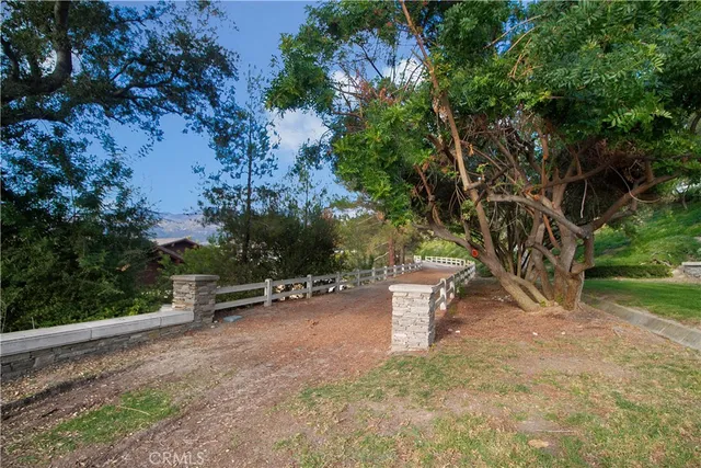 a view of a backyard with sitting area
