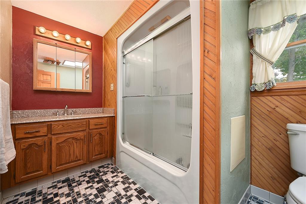 38 Manor Road Donora, PA 15033 - Photo 11 of 25 a bathroom with a sink a toilet and shower