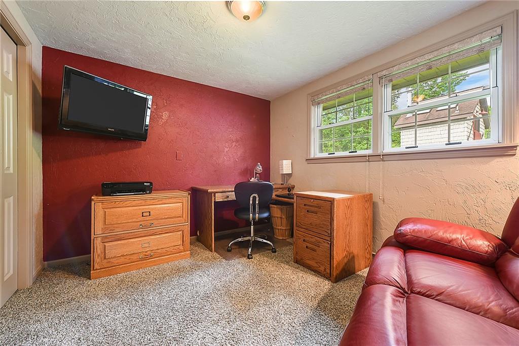 38 Manor Road Donora, PA 15033 - Photo 13 of 25 a view of workspace with furniture and a flat screen tv