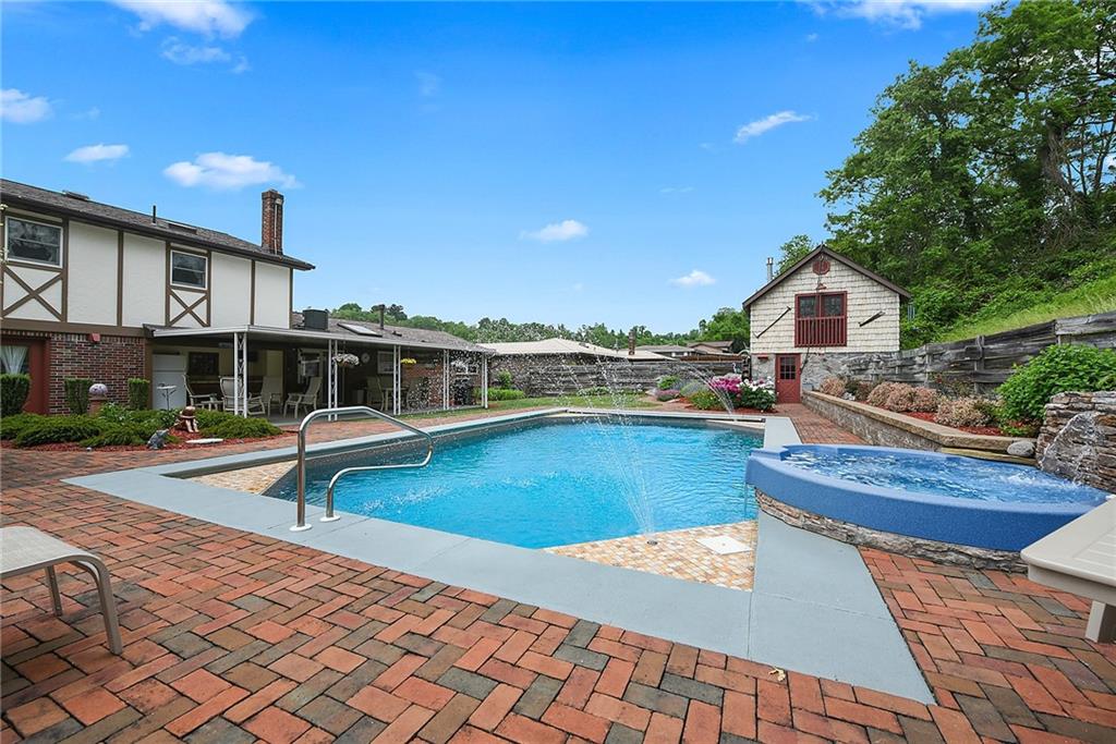 38 Manor Road Donora, PA 15033 - Photo 18 of 25 a view of a house with swimming pool and sitting area